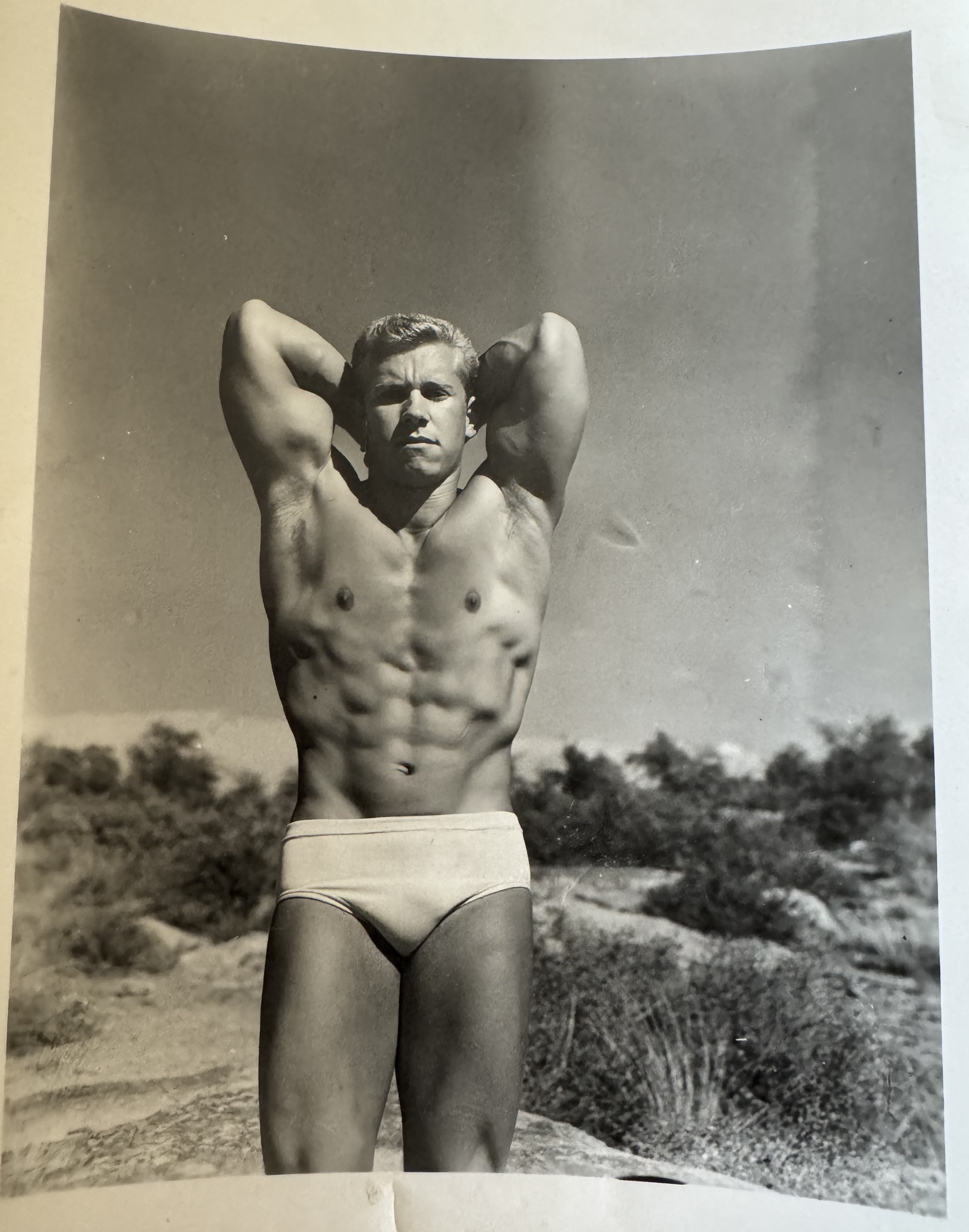 Gail Crick - profile pose on Arizona rock, hands on hips
